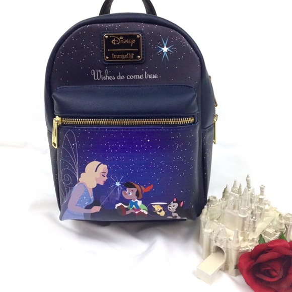 Loungefly Handbags - Loungefly Disney Pinocchio Blue/Gold Mini Backpack